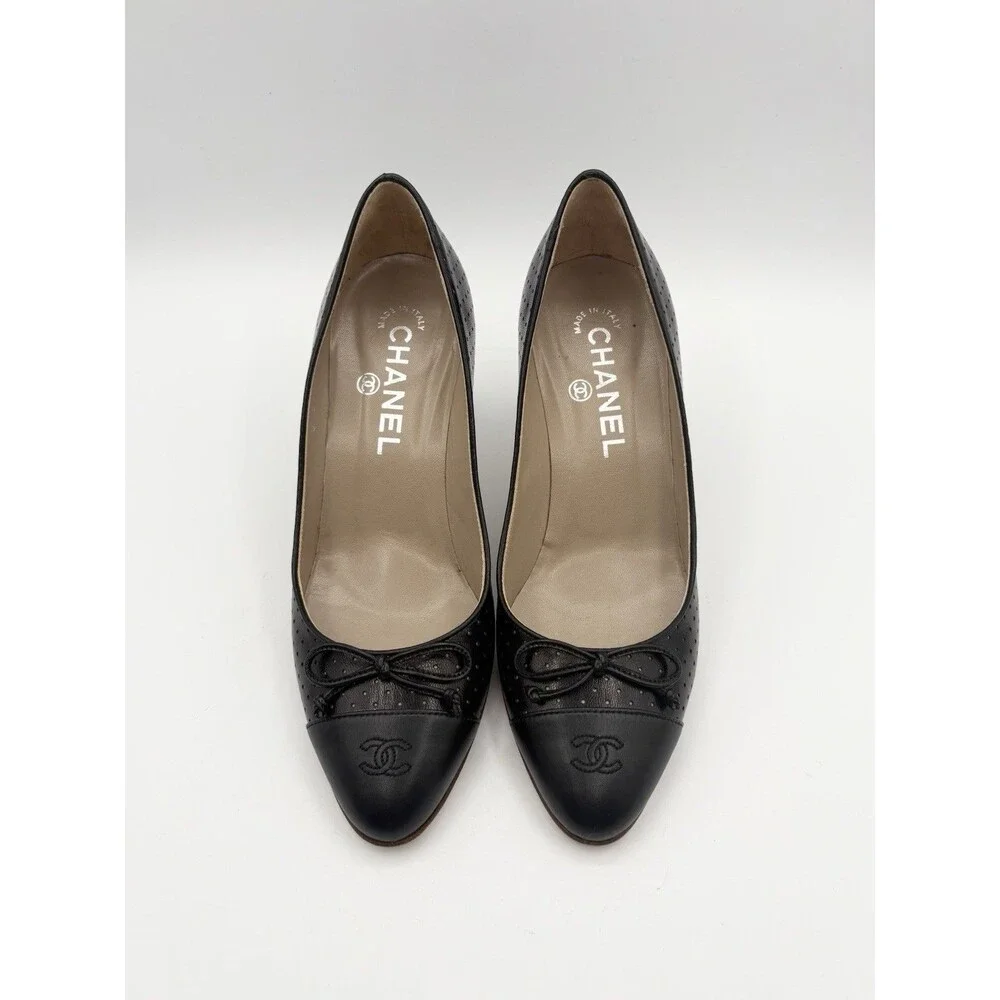 Chanel Black Perforated Leather Heels w/ CC Cap Toe & Bow Accent Size EU 36.5